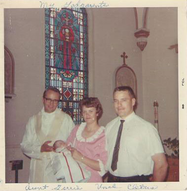 Me at my baptism with my godparents Aunt Gerrie and Uncle Cletus