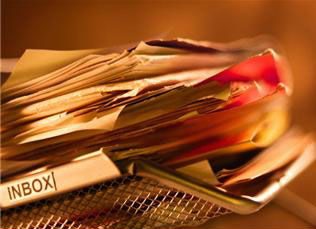 Stock photo: Inbox stuffed with paper clutter